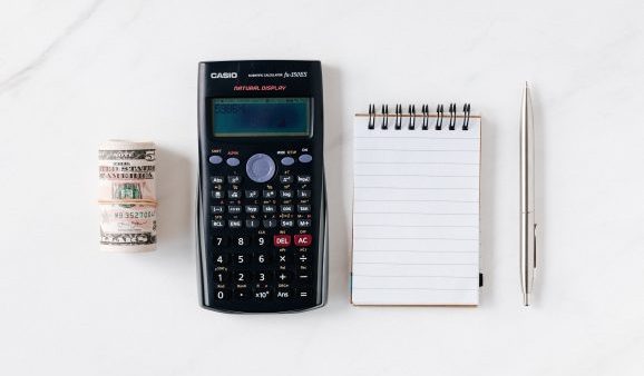 Image of calculator notepad money